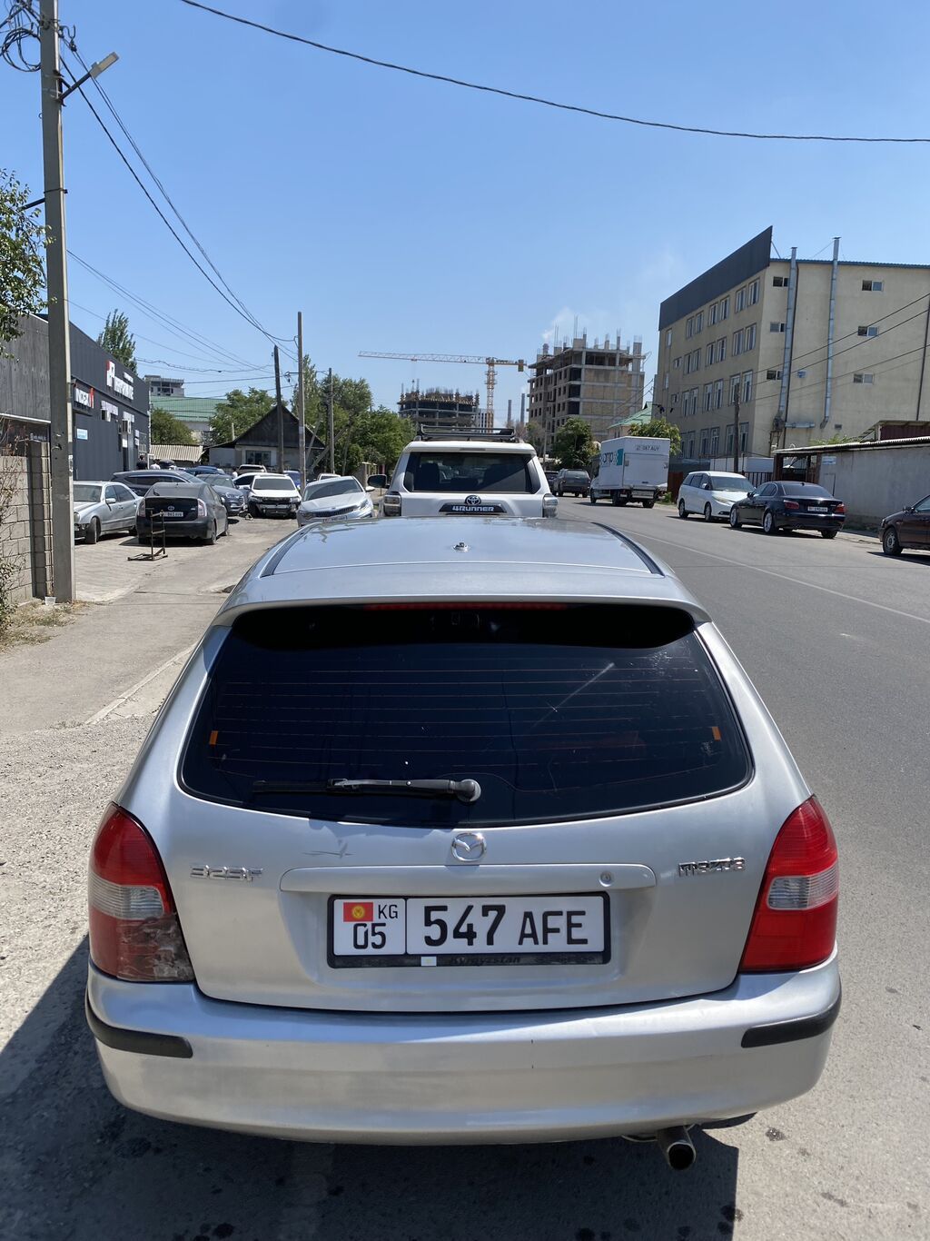 Mazda 323: 2002 г., Механика, Бензин, Хэтчбэк: фото 2