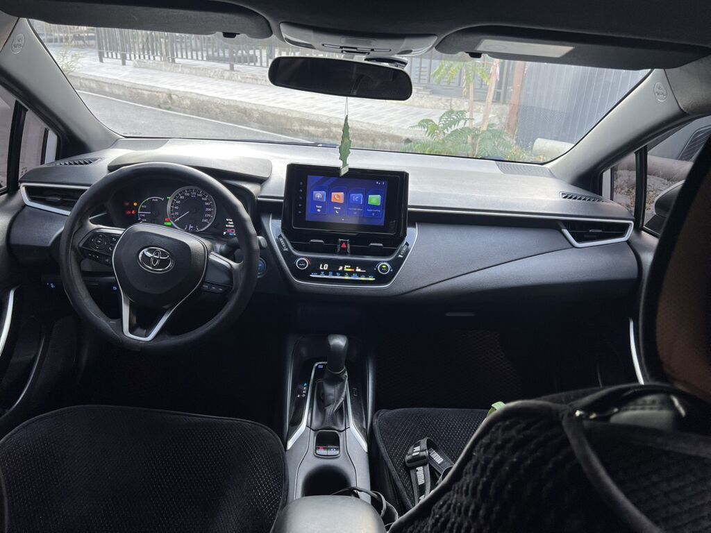 Toyota Corolla: 2024 г., 1.8 л, Автомат, Гибрид, Седан: фото 5