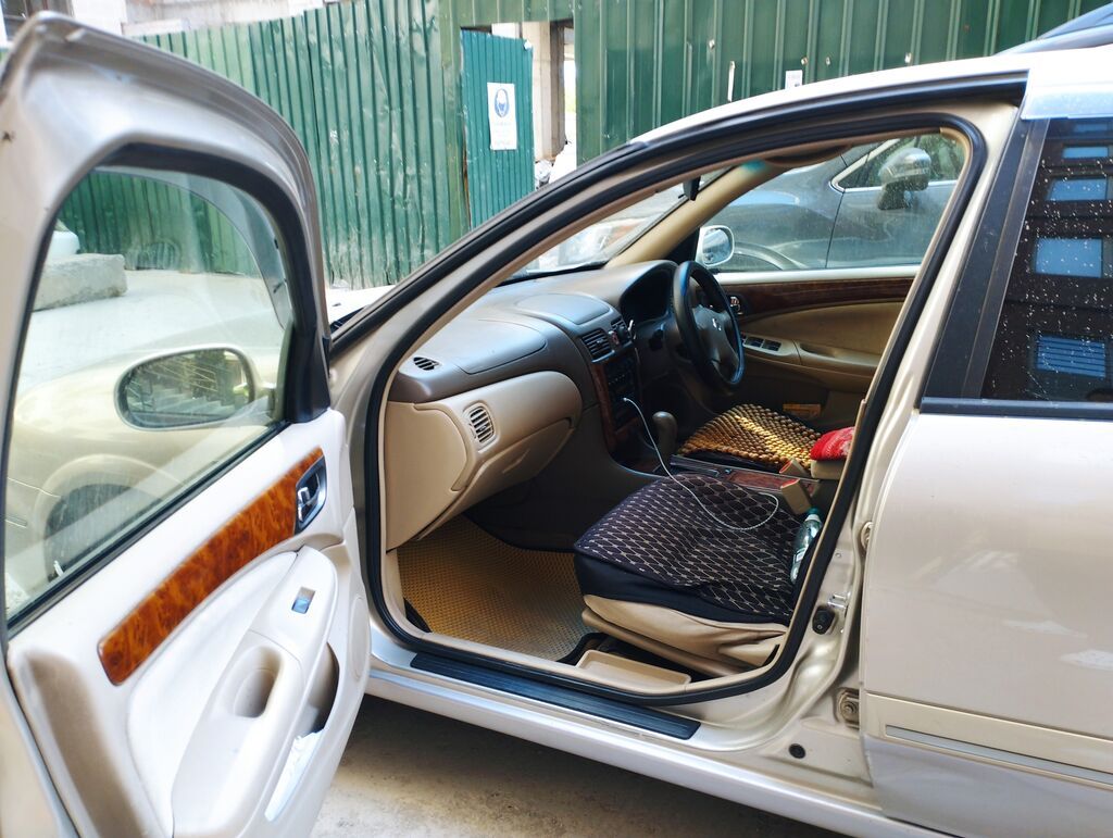 Nissan Sunny: 2004 г., Автомат, Бензин, Седан: фото 2