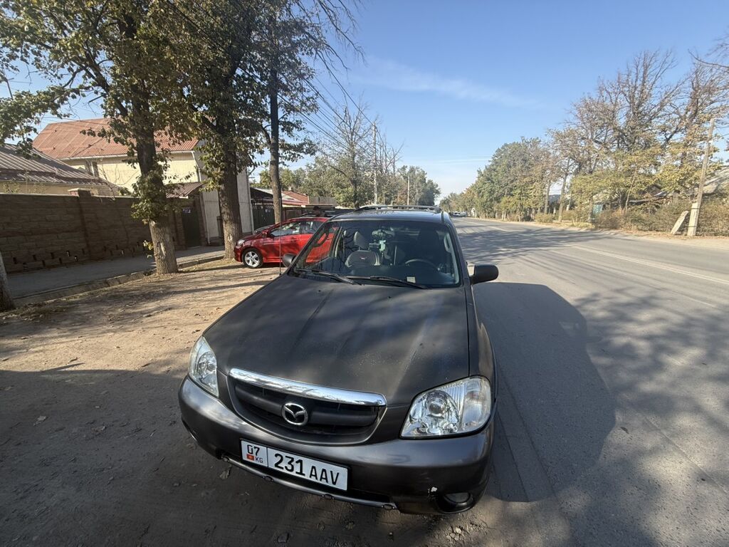 Mazda Tribute: 2002 г., 3 л, Автомат, Газ, Кроссовер: фото 2