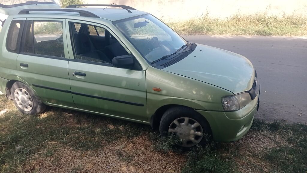 Mazda Demio: 2003 г., 1.3 л, Механика, Бензин, Хэтчбэк: фото 2