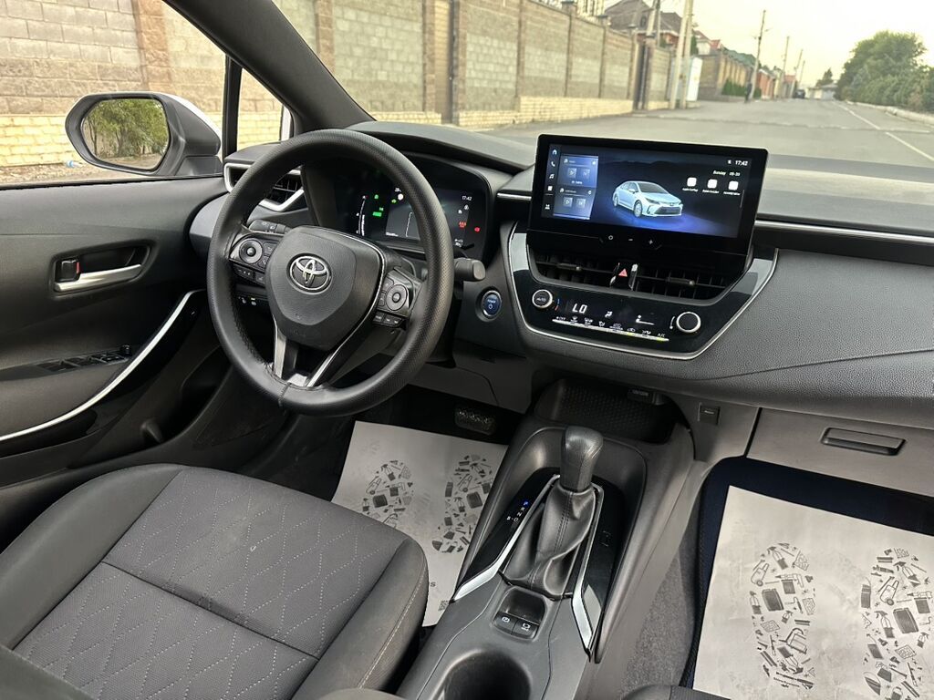 Toyota Corolla: 2023 г., 1.8 л, Автомат, Гибрид, Седан: фото 8