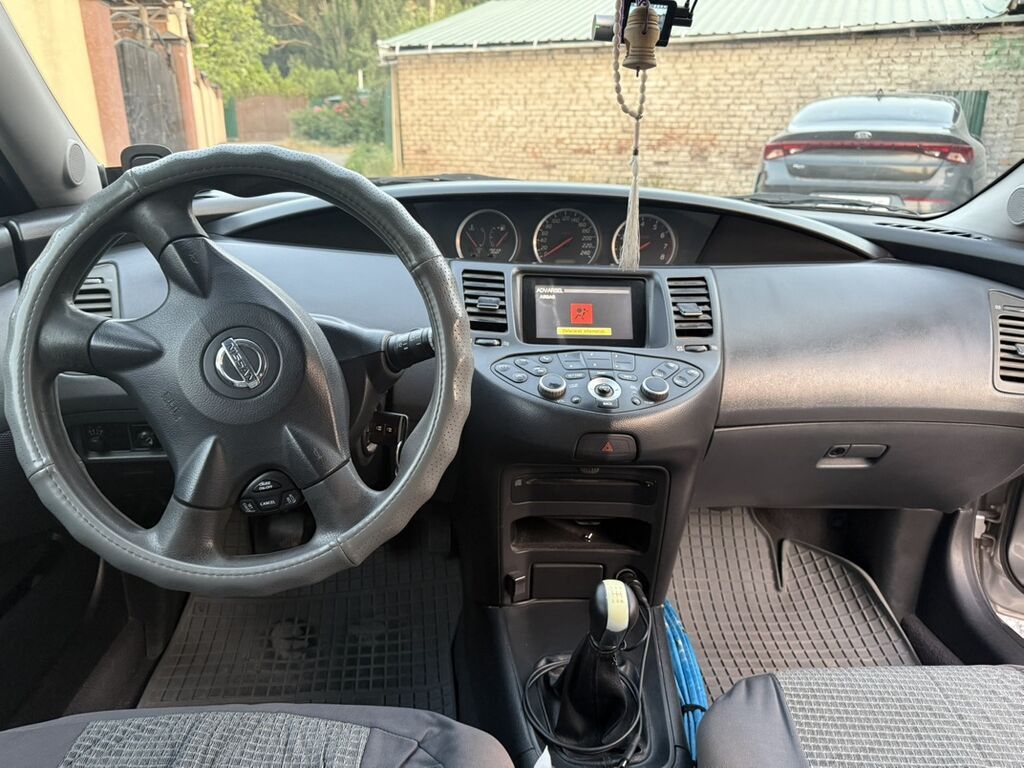 Nissan Primera: 2004 г., Механика, Универсал: фото 6