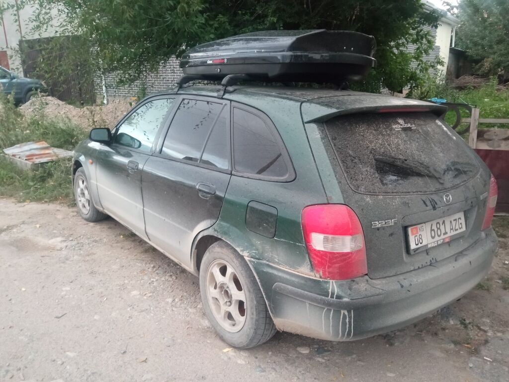 Mazda 323: 1999 г., 1.6 л, Механика, Бензин, Универсал: фото 3