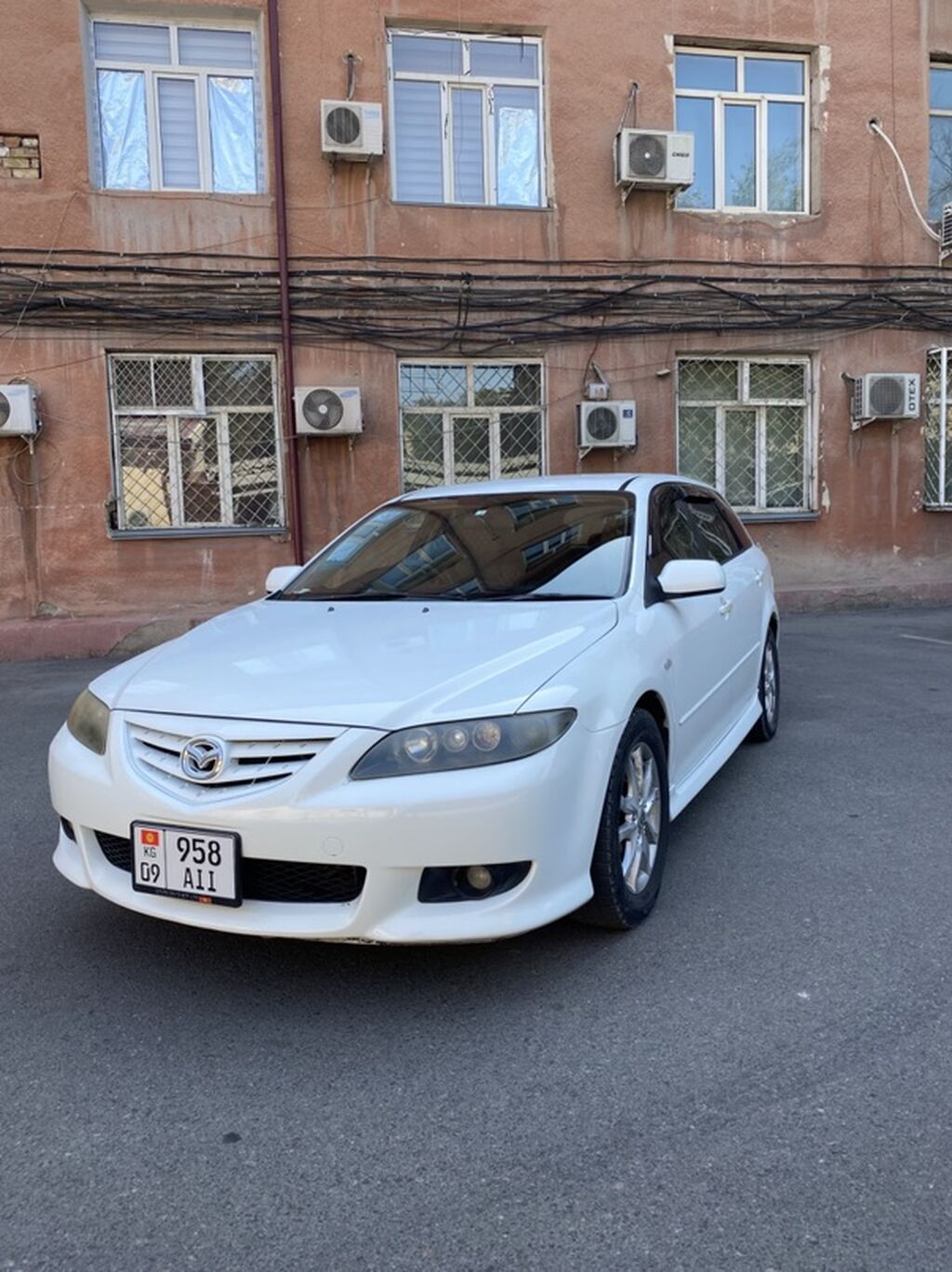 Mazda Atenza: 2003 г., 2.3 л, Автомат, Газ, Универсал: фото 4