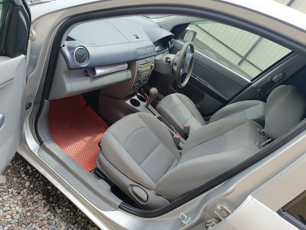 Mazda Demio: 2002 г., 1.3 л, Автомат, Бензин, Универсал: фото 6