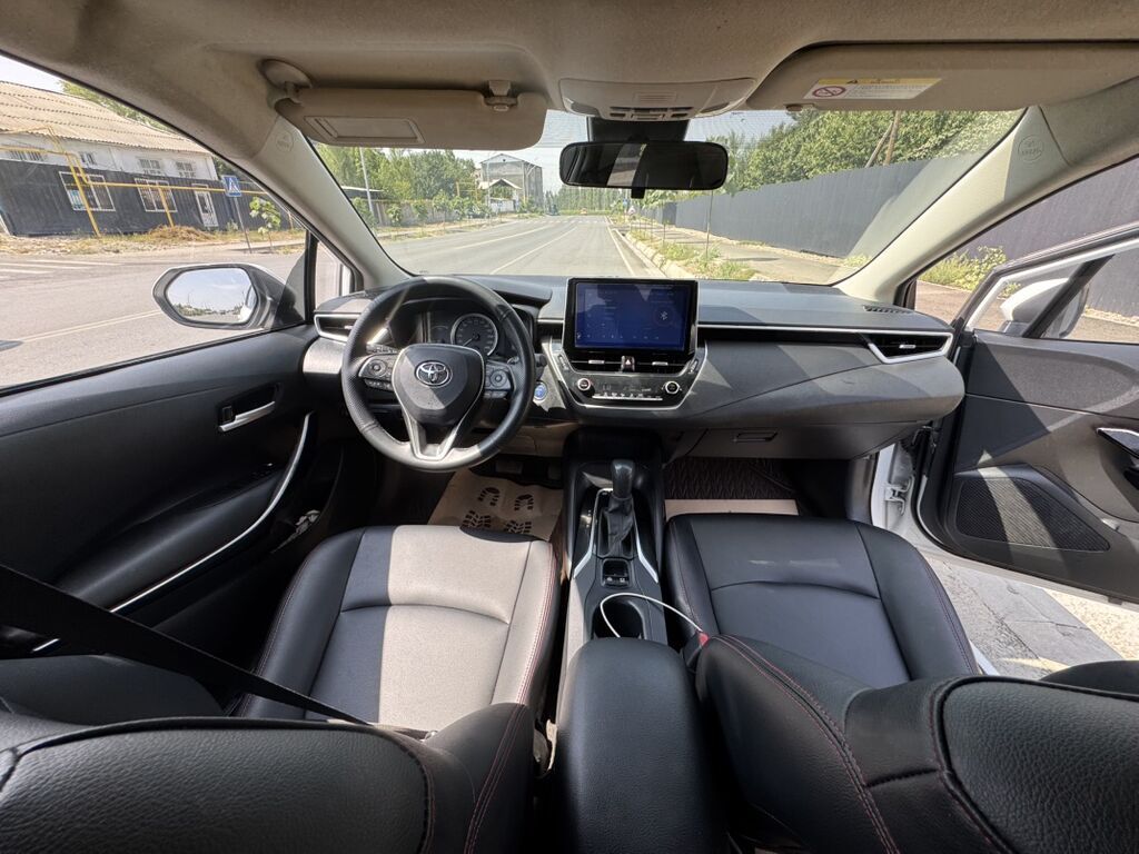 Toyota Corolla: 2021 г., 1.8 л, Автомат, Гибрид, Седан: фото 5