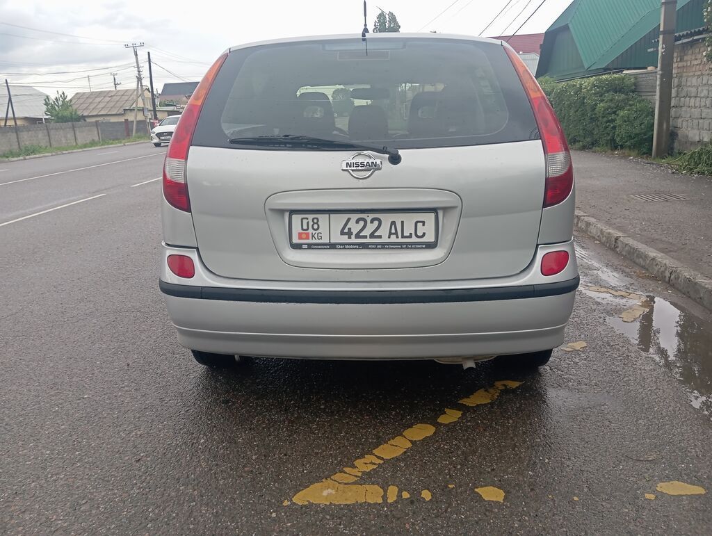 Nissan Tino: 2001 г., 1.8 л, Механика, Бензин, Хэтчбэк — фото 2