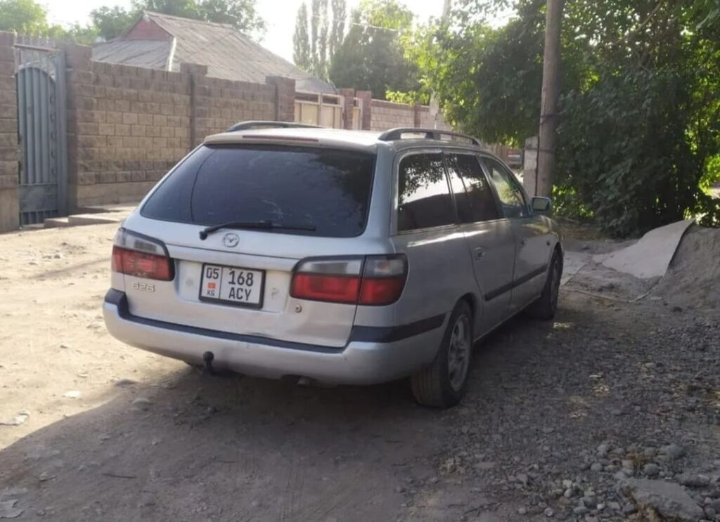 Mazda 626: 1999 г., 2 л, Механика, Газ, Универсал: фото 2