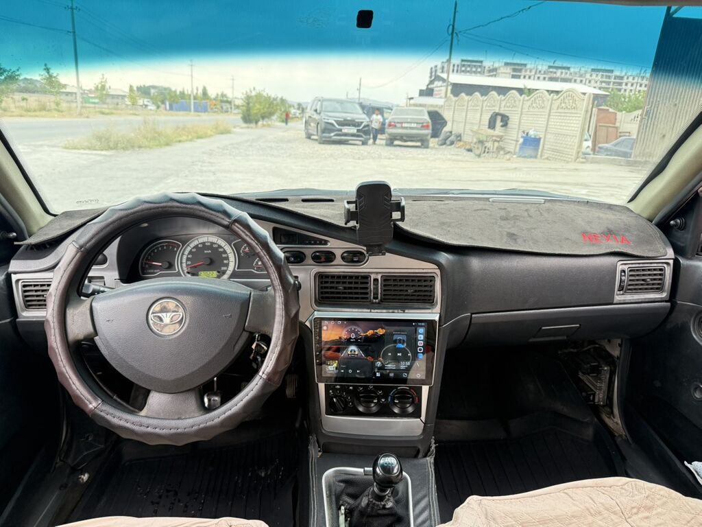 Daewoo Nexia: 2012 г., 1.5 л, Механика, Газ, Седан: фото 5