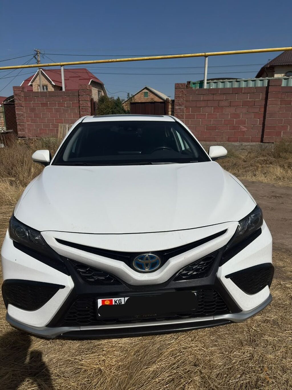Toyota Camry: 2023 г., 2.5 л, Автомат, Гибрид, Седан: фото 1