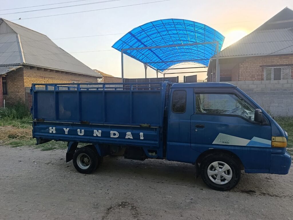 Hyundai Porter (Porter/Porter I) — компактный бортовой грузовик синего: фото 2