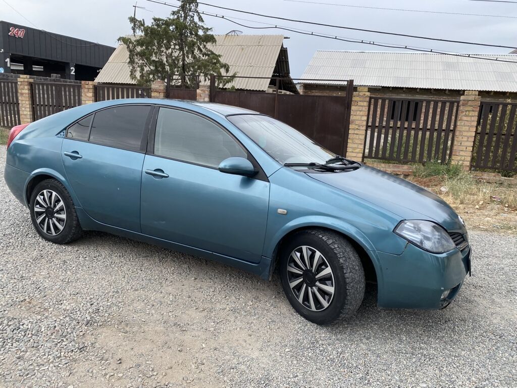 Nissan Primera: 2003 г., 2 л, Механика, Газ, Хэтчбэк: фото 5