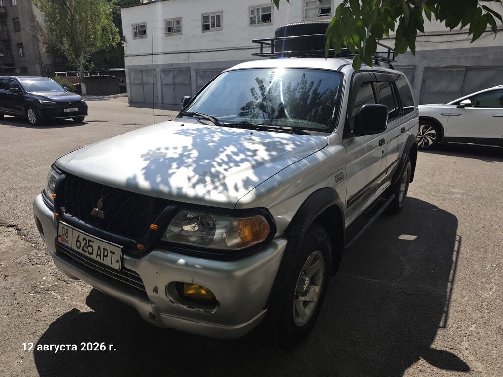 Mitsubishi Pajero Sport: 2003 г., 3 л, Автомат, Газ, Внедорожник: фото 2