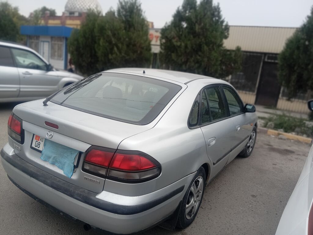 Срочно продам Mazda 626, 1998 г., 2 л, механика: фото 6