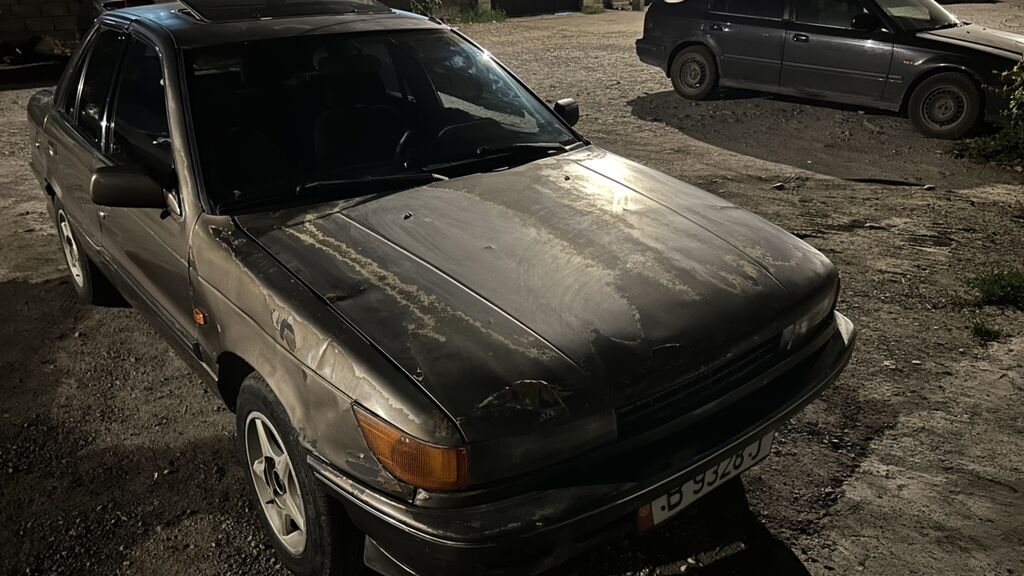 Mitsubishi Lancer: 1991 г., 1.5 л, Механика, Бензин: фото 2