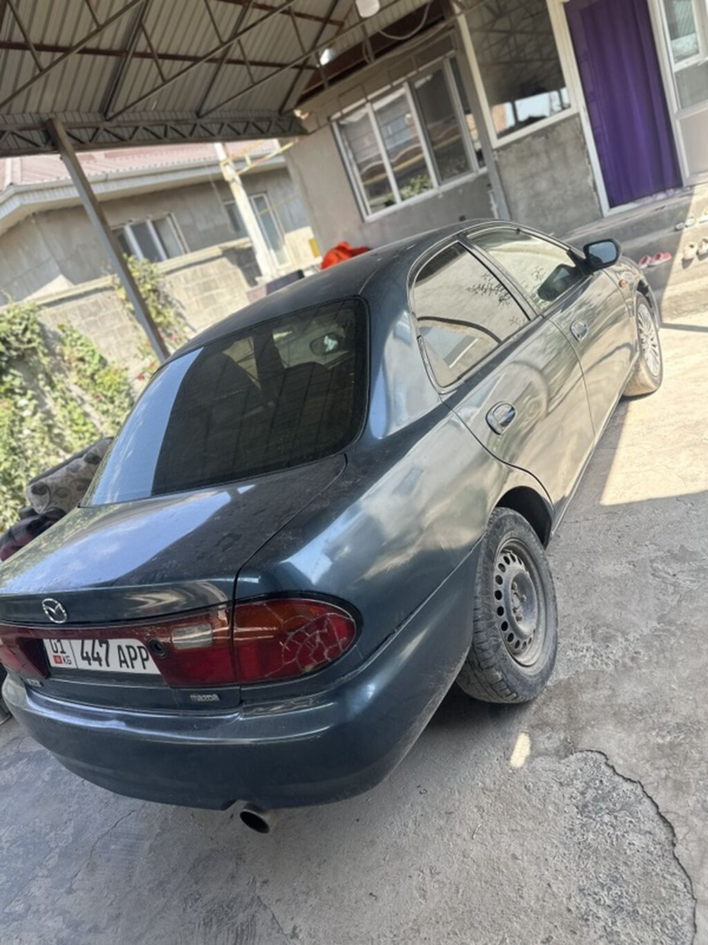 Mazda 323: 1997 г., 1.4 л, Механика, Бензин, Седан: фото 3