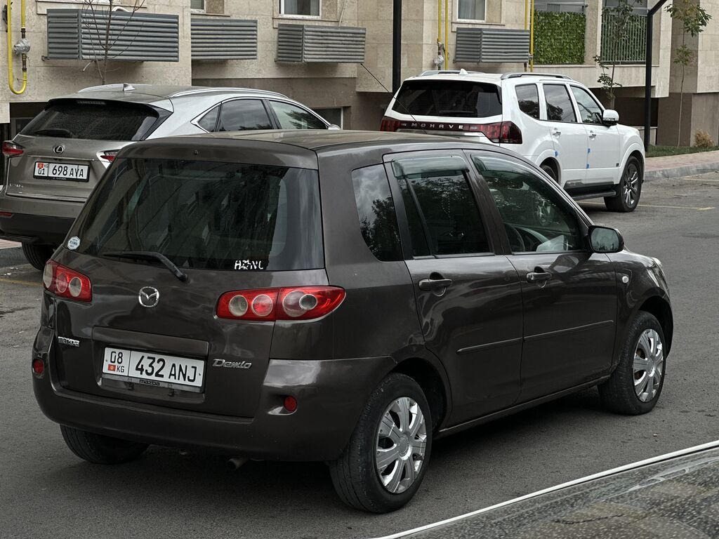 Mazda Demio: 2004 г., 1.3 л, Автомат, Бензин, Хэтчбэк: фото 4