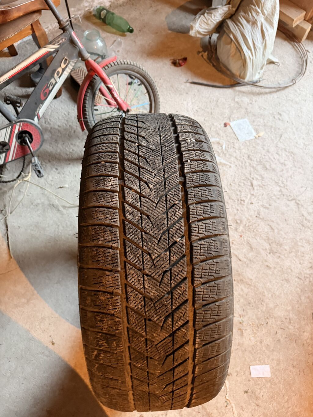 Зимняя шина 275/40 R22 107H. Направленный рисунок протектора с: фото 1