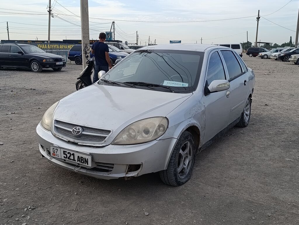 Toyota Corolla: 2010 г., 1.8 л, Механика, Бензин, Седан: фото 2