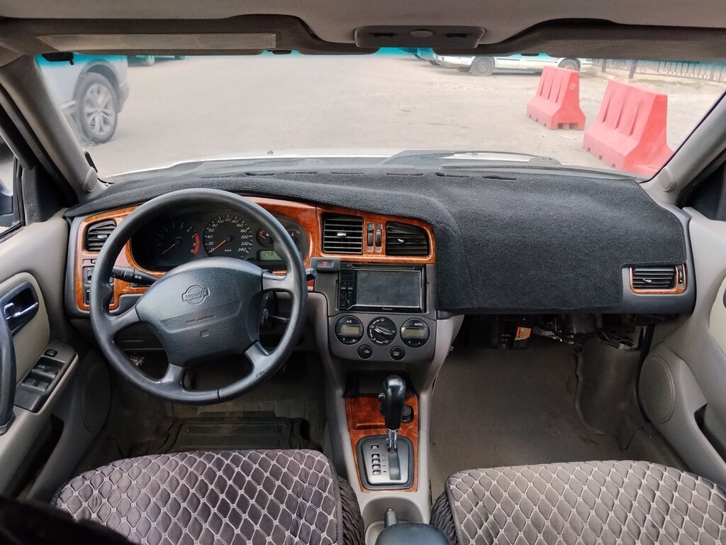 Nissan Primera: 1999 г., 2 л, Автомат: фото 7