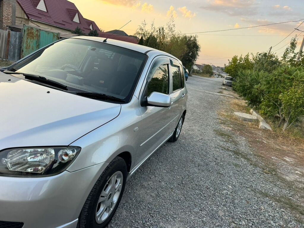 Mazda Demio: 2003 г., 1.3 л, Автомат, Бензин, Хэтчбэк: фото 3