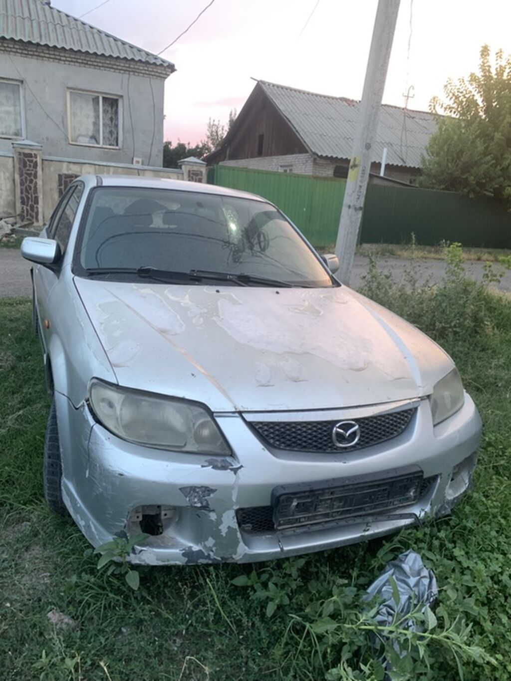 Mazda 323: 2003 г., 2 л, Механика, Бензин, Универсал — фото 1