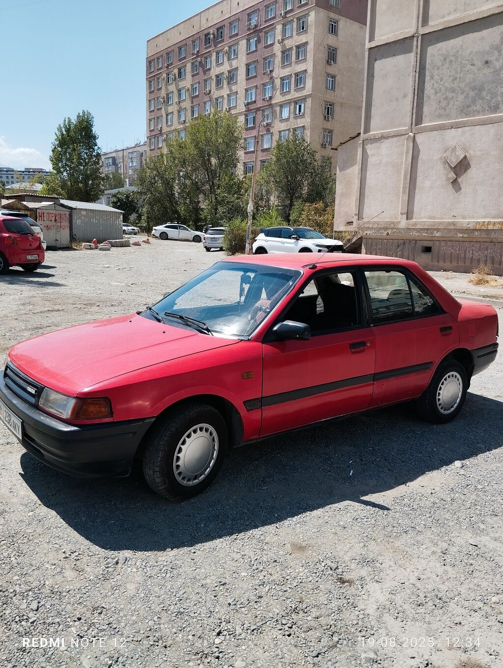 Mazda 323: 1991 г., 1.6 л, Механика, Бензин, Седан: фото 1