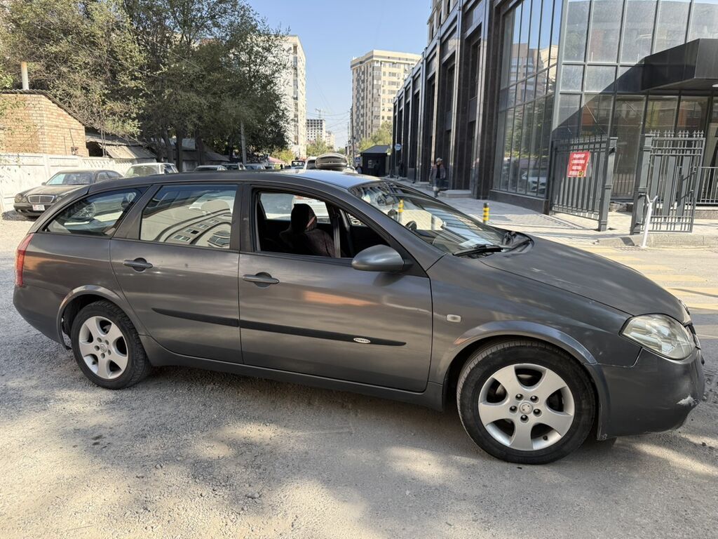 Nissan Primera: 2004 г., 2 л, Механика, Бензин, Универсал: фото 2