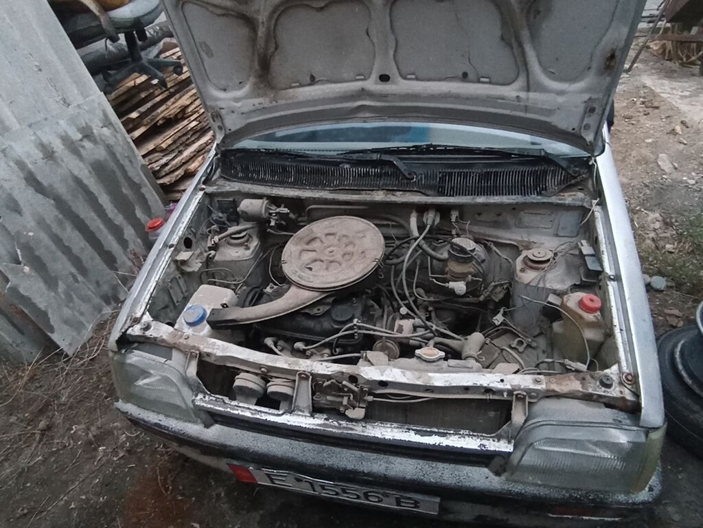 Daihatsu Cuore: 1989 г., 0.8 л, Механика, Бензин: фото 6