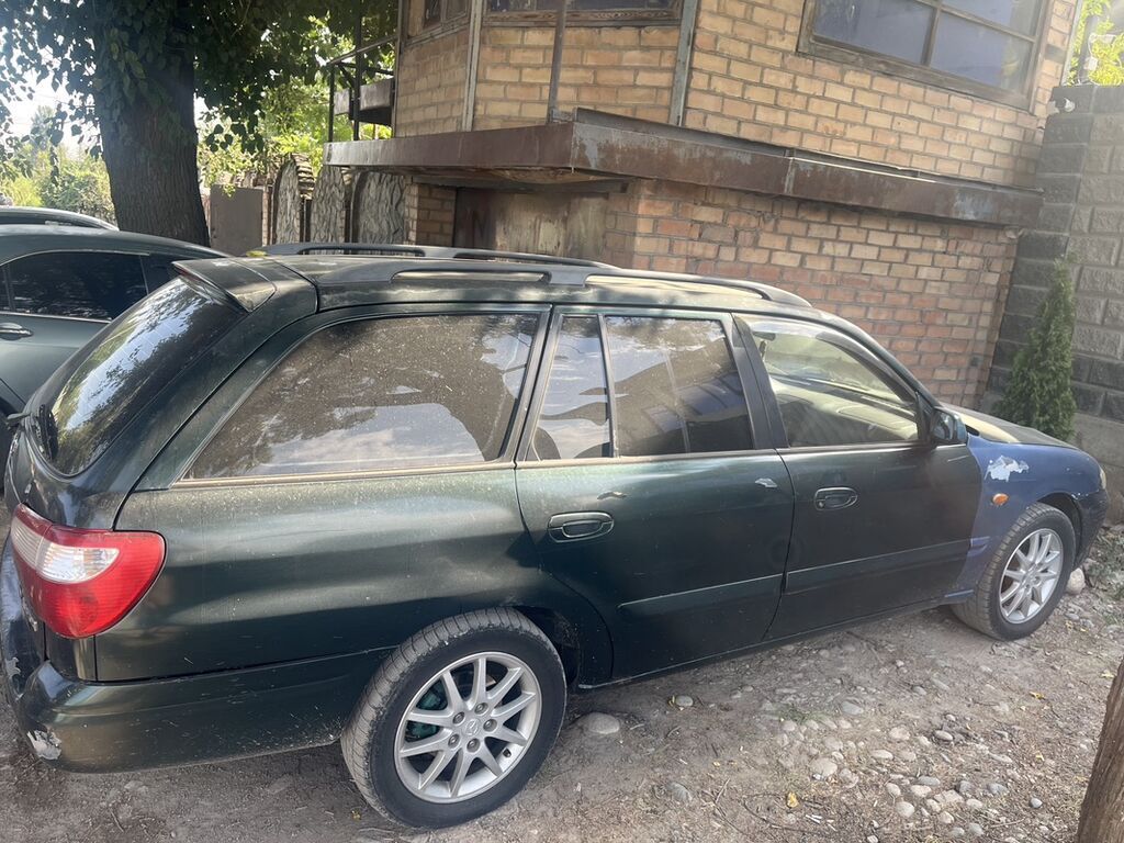 Mazda Capella: 2001 г., Бензин, Универсал: фото 4