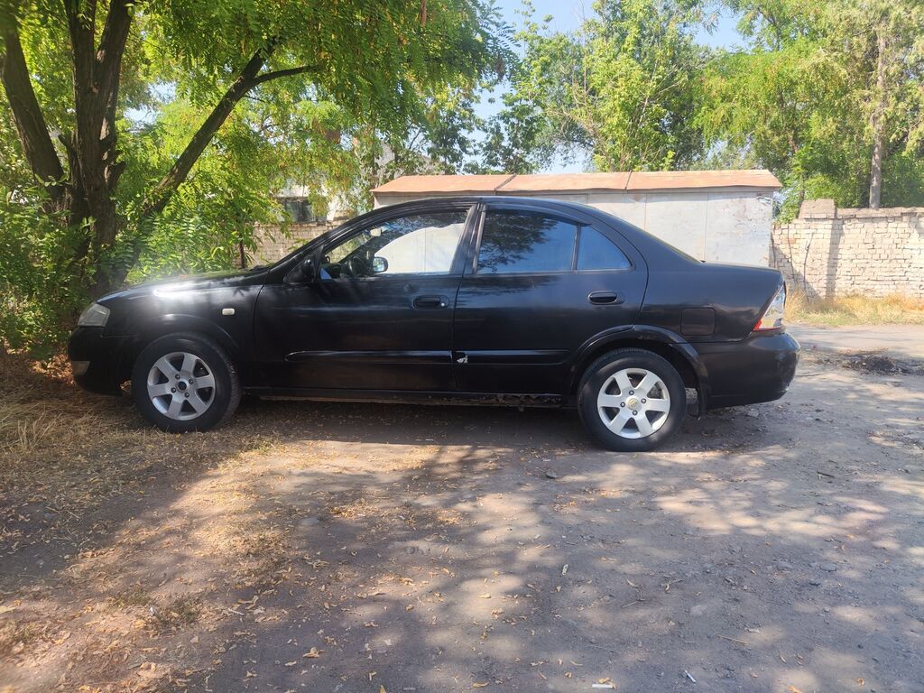 Nissan Almera Classic: 2009 г., 1.8 л, Автомат, Бензин: фото 7