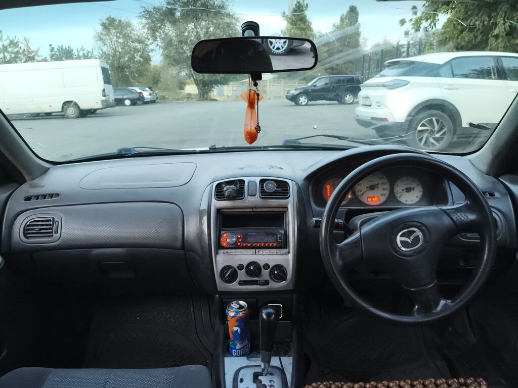 Mazda Familia 2001 г., 1.6 л, автомат, универсал: фото 1
