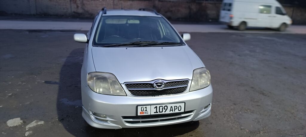Toyota Corolla: 2003 г., 1.8 л, Автомат, Бензин, Универсал: фото 2