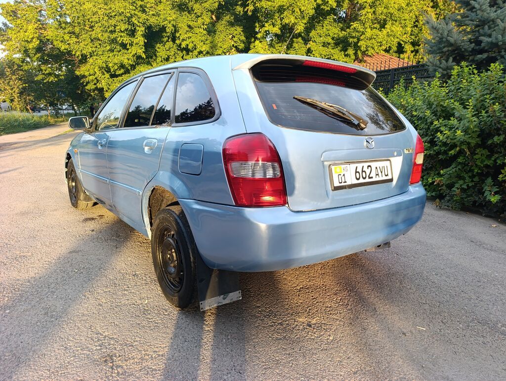 Mazda 323: 2003 г., 1.6 л, Механика, Бензин, Универсал: фото 6