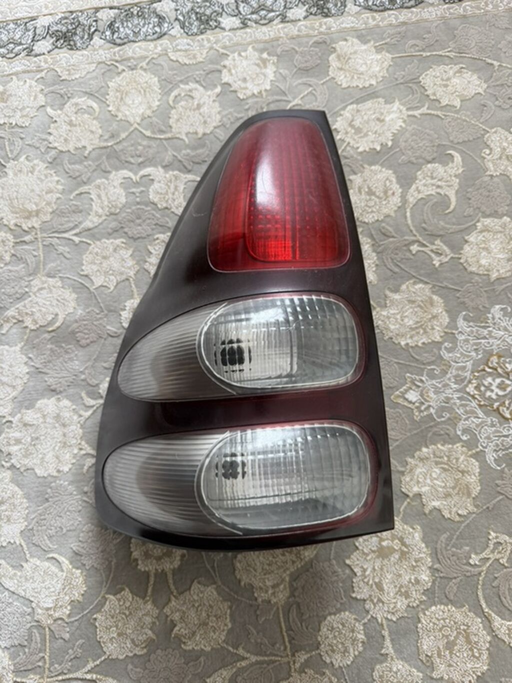 Задний стоп-сигнал (левый). Оригинал на Toyota Prado 120. Матовый: фото 2