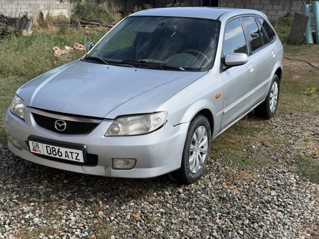 Mazda 323: 2003 г., 1.6 л, Механика, Бензин, Хэтчбэк: фото 2