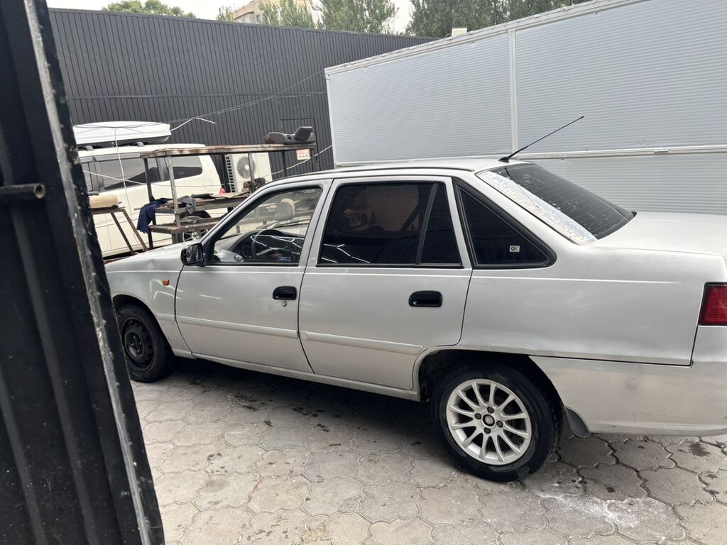 Daewoo Nexia: 2010 г., 1.6 л, Механика, Седан: фото 4