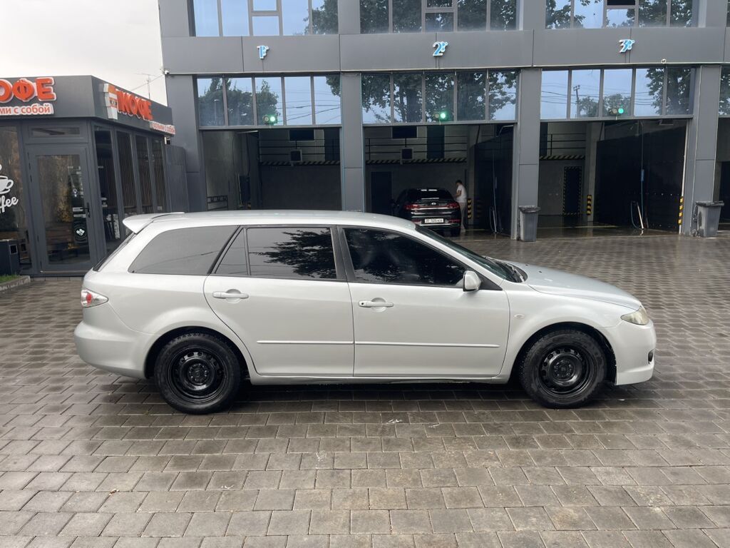 Mazda 6: 2002 г., 2 л, Автомат, Бензин, Универсал: фото 5