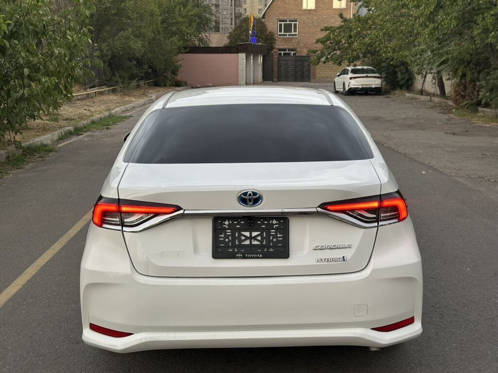 Toyota Corolla: 2023 г., 1.8 л, Автомат, Гибрид, Седан: фото 5