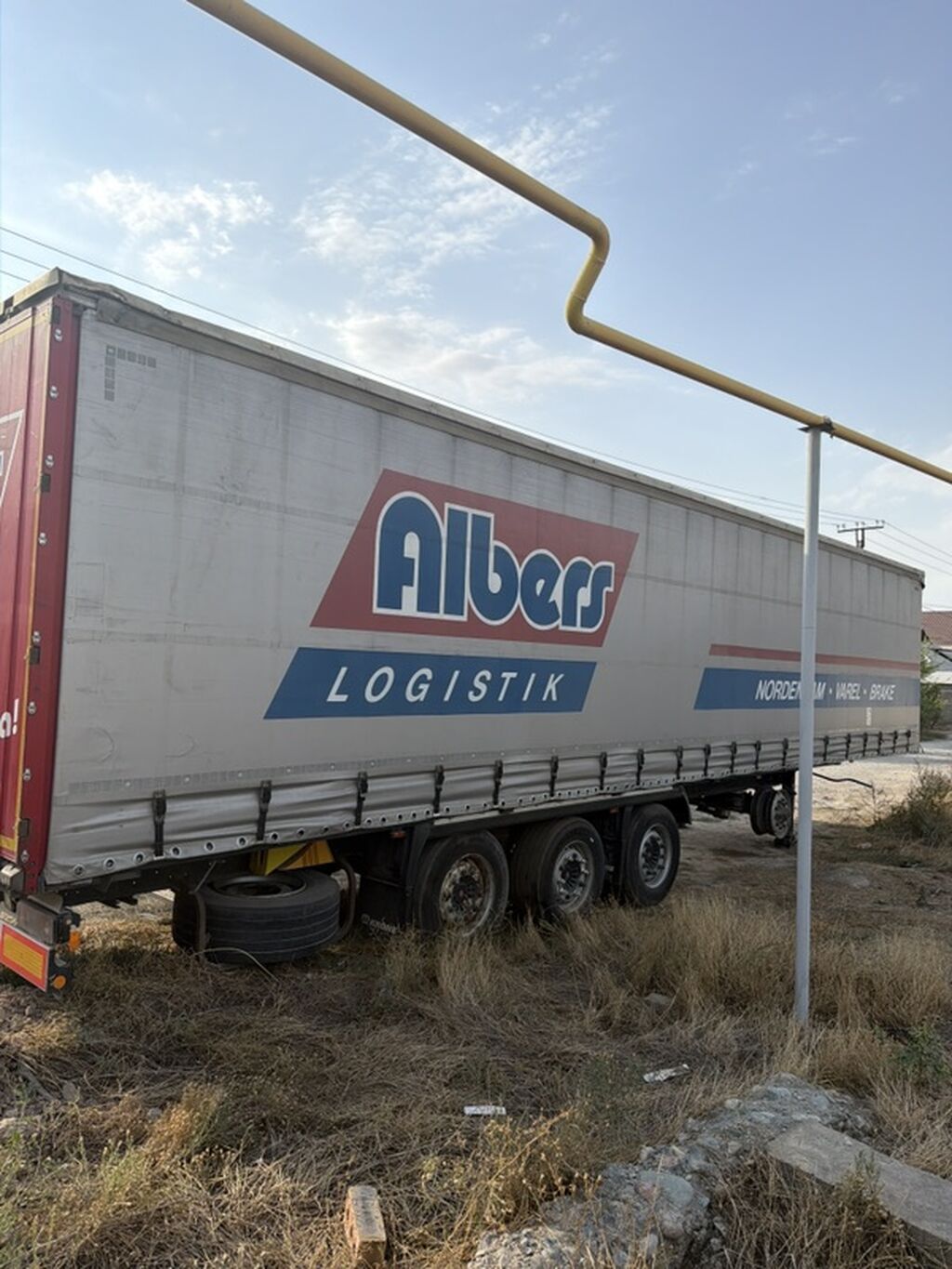Тентованный полуприцеп-шторка Albers LOGISTIK, трехосный. Основные: фото 3
