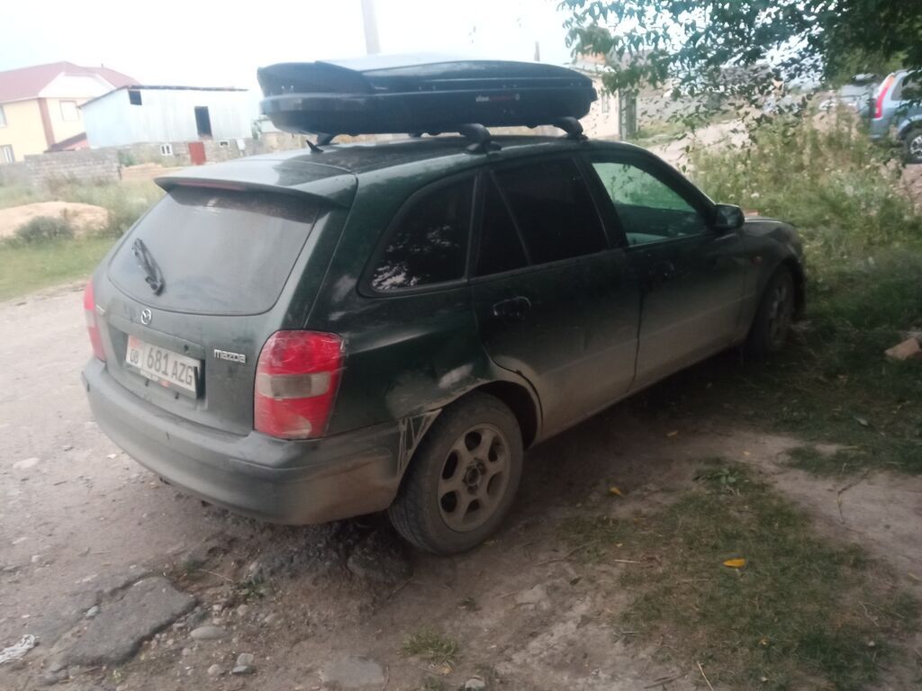 Mazda 323: 1999 г., 1.6 л, Механика, Бензин, Универсал: фото 2