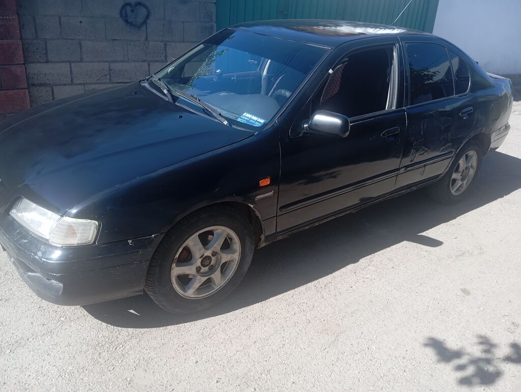 Nissan Primera: 1996 г., 2 л, Механика, Бензин, Седан: фото 5
