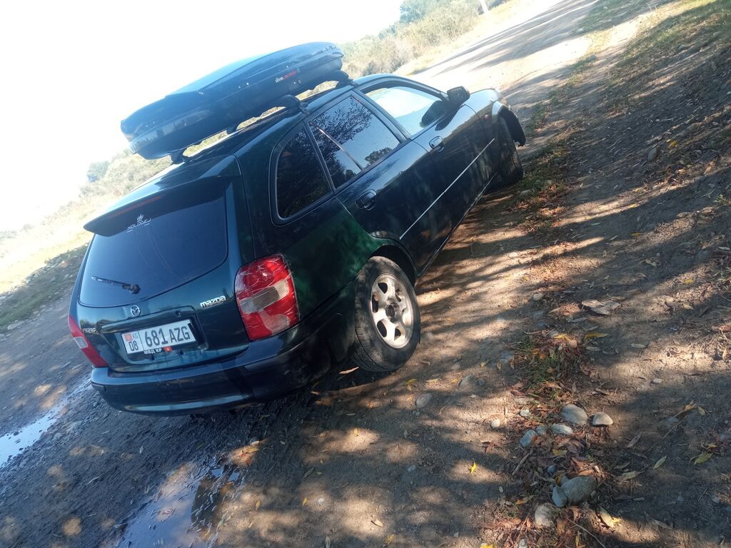 Mazda Familia: 1999 г., 1.6 л, Механика, Бензин, Универсал: фото 8