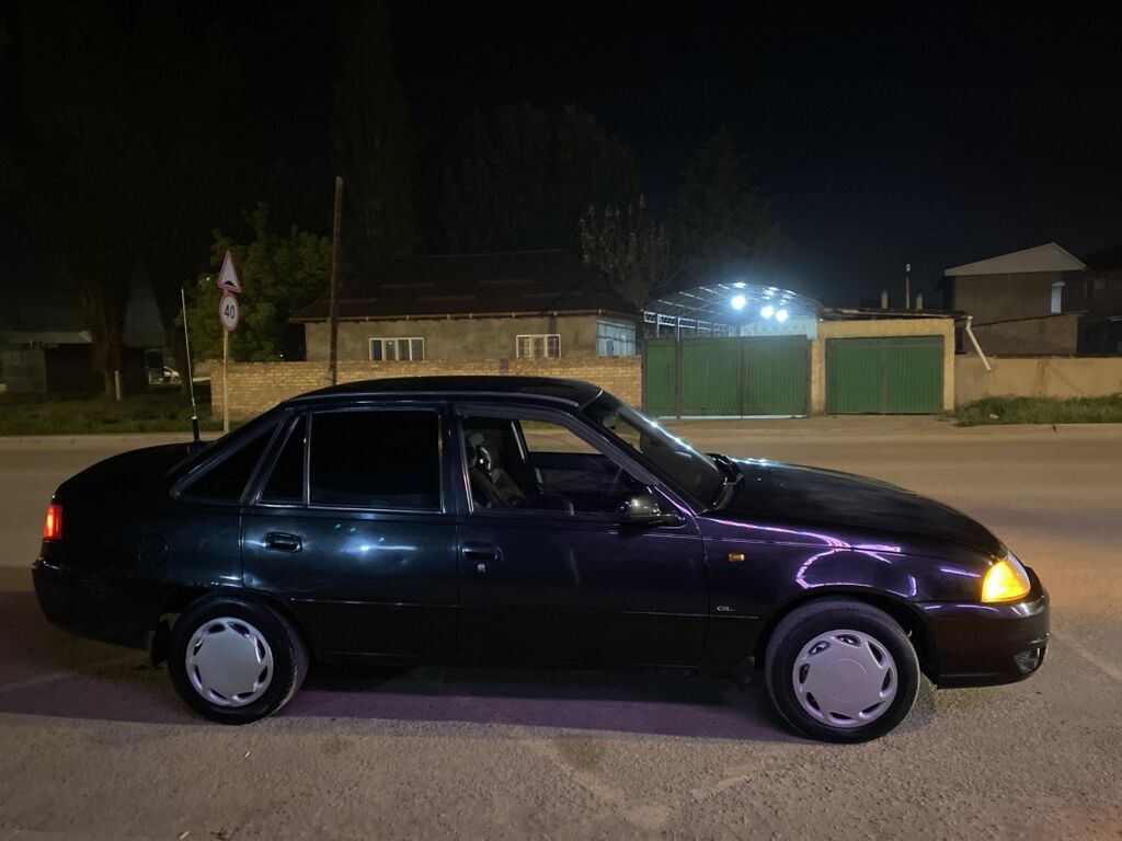 Daewoo Nexia: 2011 г., 1.5 л, Механика, Бензин, Седан: фото 8