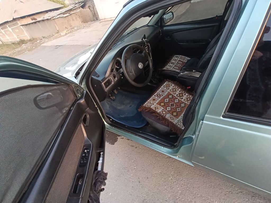 Daewoo Nexia: 2009 г., 1.6 л, Механика, Бензин, Седан: фото 8