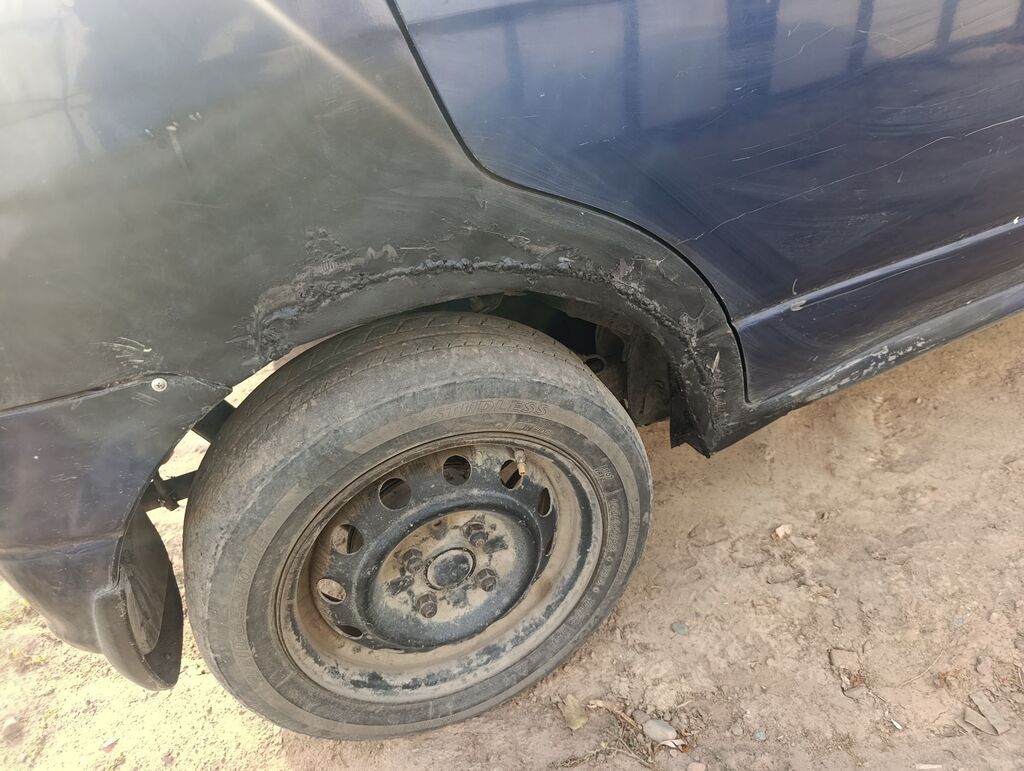 Daihatsu Cuore: 2003 г., 1 л, Механика, Бензин, Универсал: фото 7
