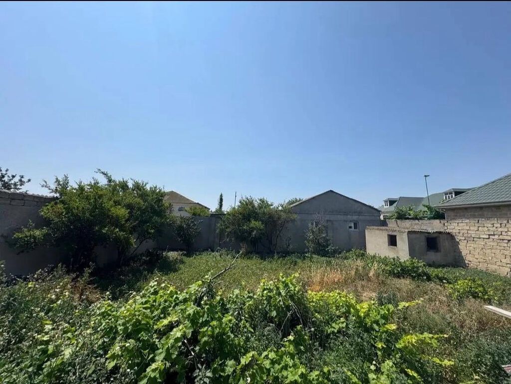 Maştağa qəsəbəsində tam mərkəzdə 209 nom məktəbin yuxarı istiqamətində
