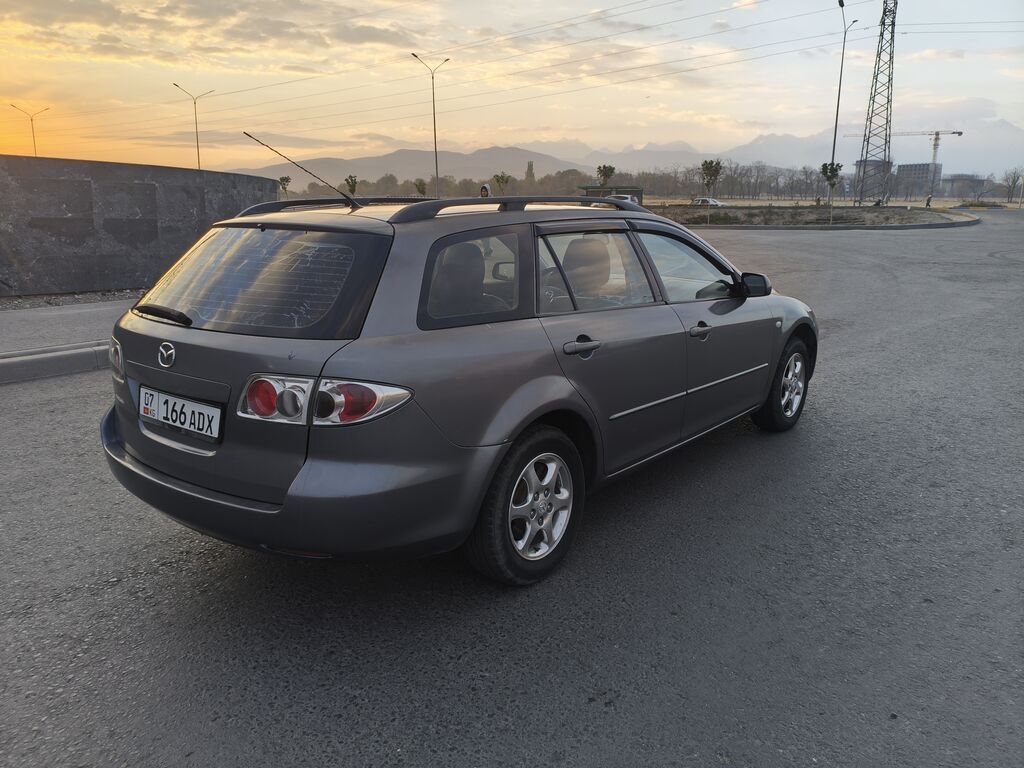 Mazda 6: 2004 г., 2.3 л, Механика, Бензин, Универсал: фото 3