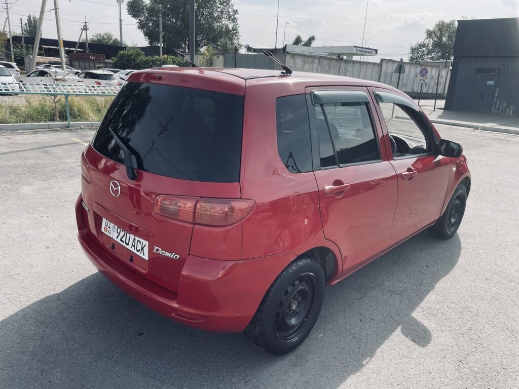 Mazda Demio: 2003 г., 1.5 л, Автомат, Газ, Хэтчбэк: фото 3